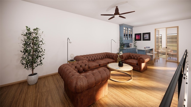 living area featuring ceiling fan, wood finished floors, and baseboards