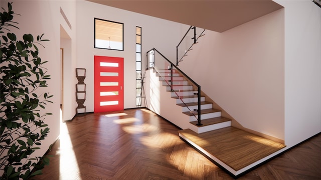 entryway featuring stairs and plenty of natural light