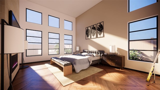 bedroom featuring a high ceiling