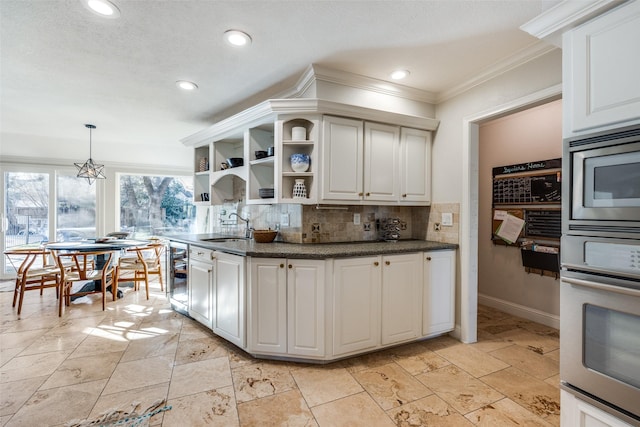 kitchen featuring white cabinets, stainless steel appliances, tasteful backsplash, wine cooler, and hanging light fixtures