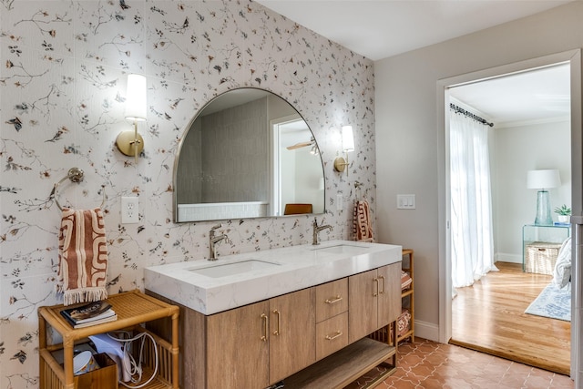 bathroom featuring tile patterned flooring and vanity