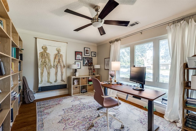 office area featuring a textured ceiling, ceiling fan, crown molding, and dark hardwood / wood-style floors