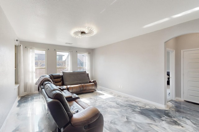 6217 Jackstaff Dr, Fort Worth, TX 76179 - living area with arched walkways and baseboards
