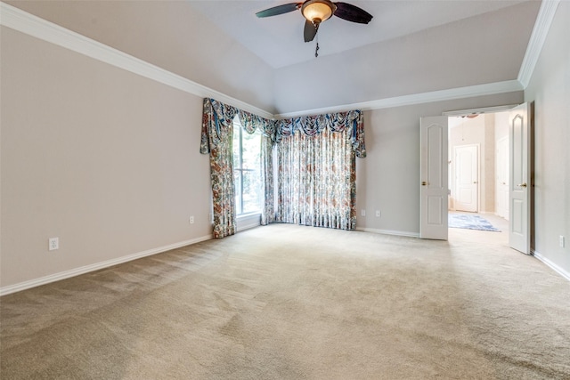 carpeted empty room with ornamental molding and ceiling fan