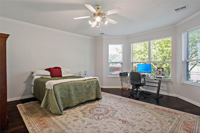 bedroom featuring ceiling fan, ornamental molding, dark hardwood / wood-style flooring, and multiple windows