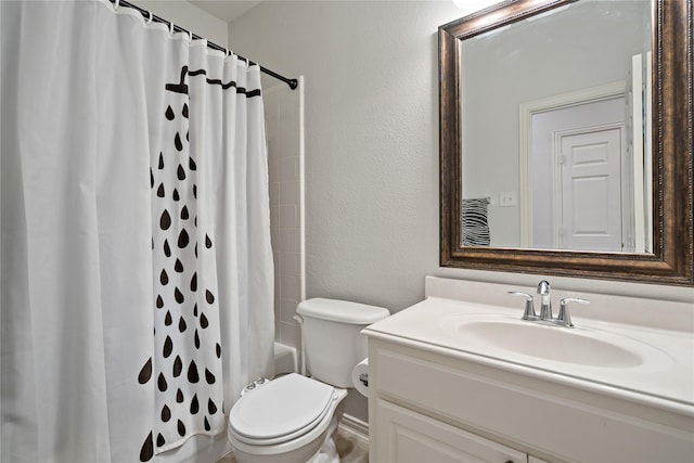 full bathroom with vanity, toilet, and shower / bath combo