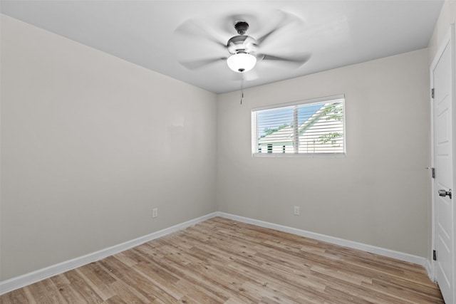 spare room with light hardwood / wood-style floors and ceiling fan