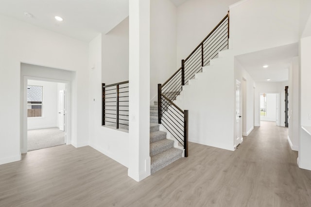 1217 Sylvia St, Desoto, TX 75115 - foyer entrance featuring wood finished floors, stairway, baseboards, and recessed lighting