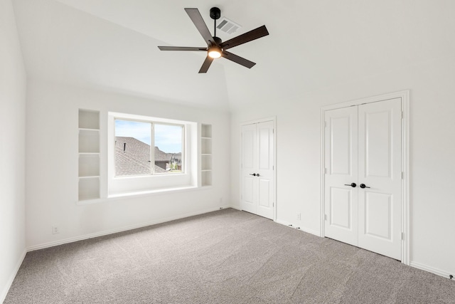 1217 Sylvia St, Desoto, TX 75115 - unfurnished bedroom featuring two closets, carpet flooring, baseboards, and high vaulted ceiling