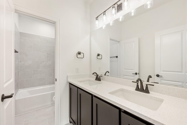 1217 Sylvia St, Desoto, TX 75115 - bathroom featuring double vanity, toilet, and washtub / shower combination