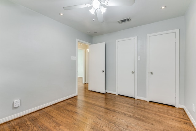 unfurnished bedroom featuring ceiling fan and light hardwood / wood-style flooring