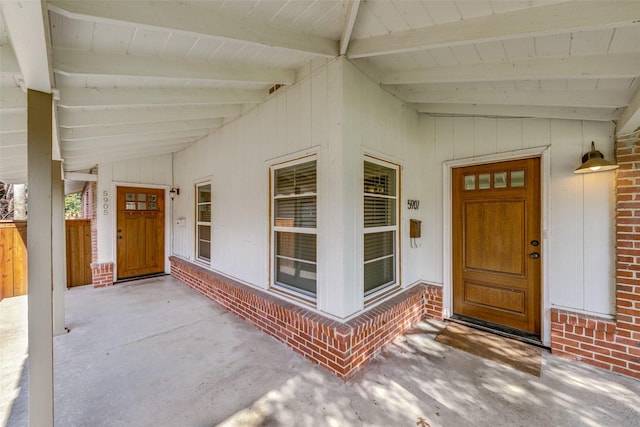 doorway to property with a porch