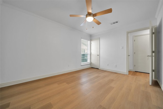 unfurnished bedroom with ceiling fan, light hardwood / wood-style floors, and ornamental molding