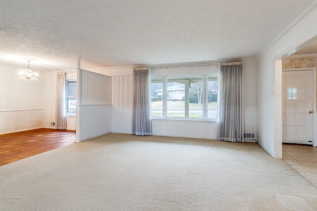 interior space featuring crown molding, an inviting chandelier, and a textured ceiling