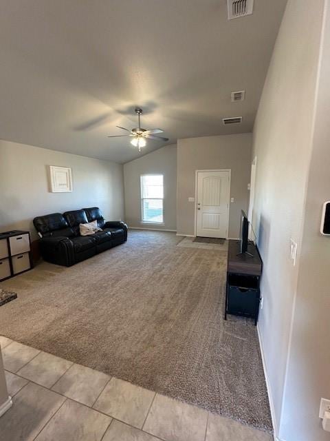 carpeted living room featuring lofted ceiling and ceiling fan