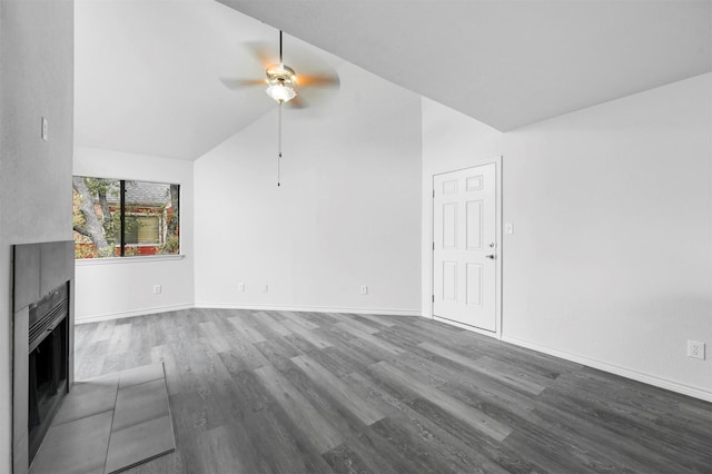 unfurnished living room with lofted ceiling, ceiling fan, and dark hardwood / wood-style flooring