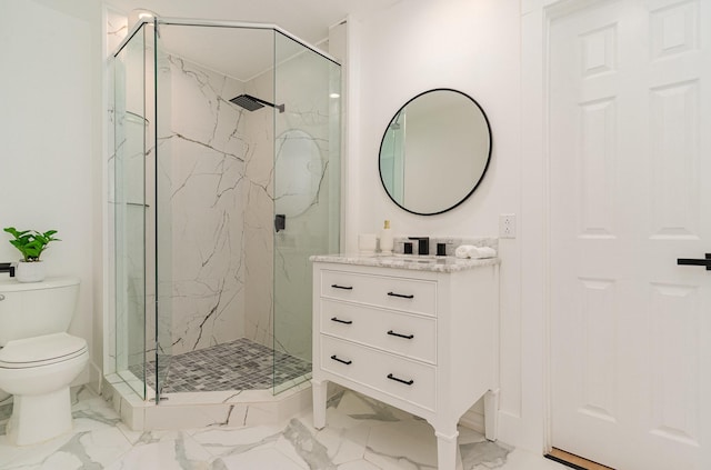 bathroom featuring walk in shower, vanity, and toilet