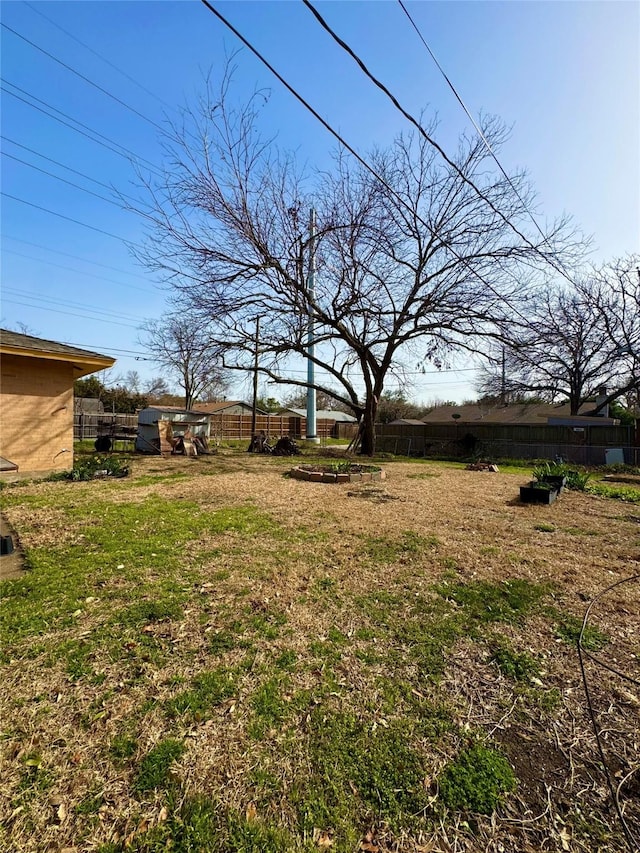 view of yard with fence