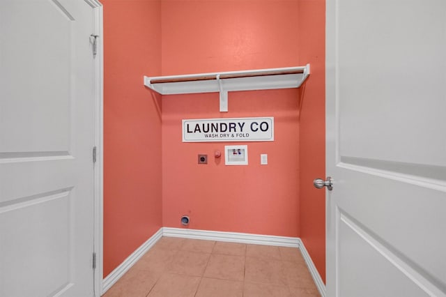 laundry area featuring washer hookup, light tile patterned floors, and hookup for an electric dryer