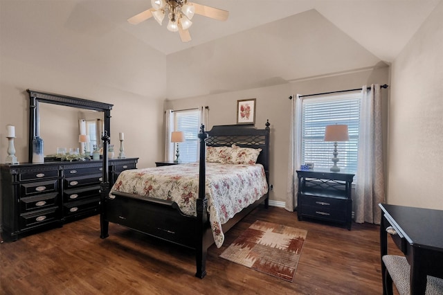 bedroom with ceiling fan, dark hardwood / wood-style flooring, multiple windows, and lofted ceiling