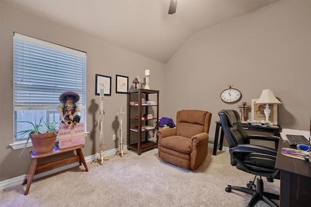 carpeted office featuring vaulted ceiling and ceiling fan