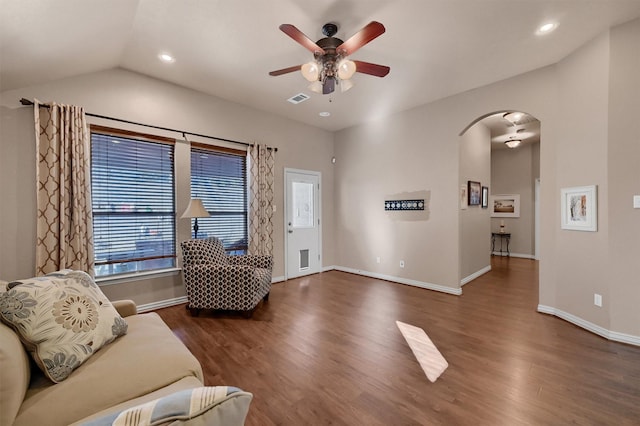 living room featuring ceiling fan, dark hardwood / wood-style flooring, and lofted ceiling