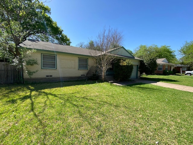 ranch-style home with a front lawn