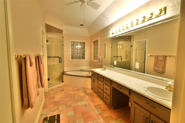 bathroom featuring ceiling fan, vanity, lofted ceiling, and shower with separate bathtub