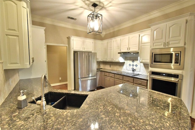 kitchen with sink, white cabinetry, and appliances with stainless steel finishes