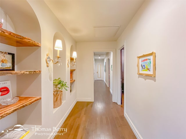 hall with light wood-type flooring