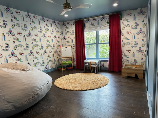 bedroom with dark wood-type flooring and ceiling fan