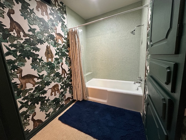 bathroom with shower / bath combination with curtain