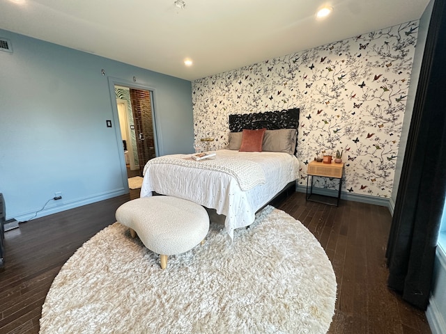 bedroom featuring dark hardwood / wood-style floors