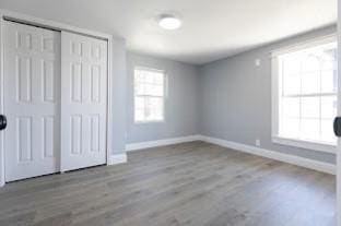 unfurnished bedroom featuring light hardwood / wood-style flooring