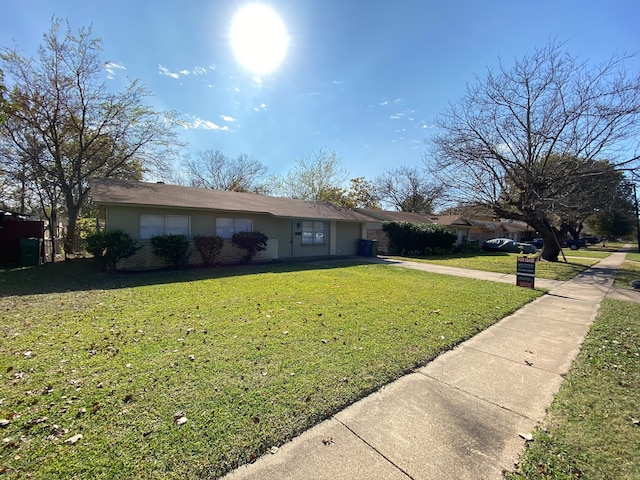 626 Sunset Dr, Garland, TX 75040 - single story home featuring a front lawn and concrete driveway