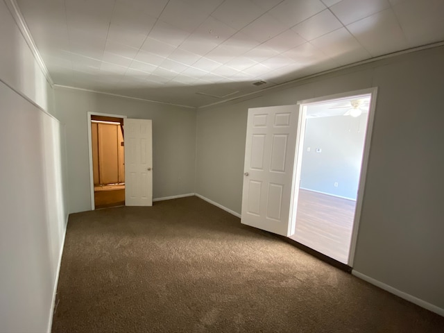 unfurnished room with carpet floors