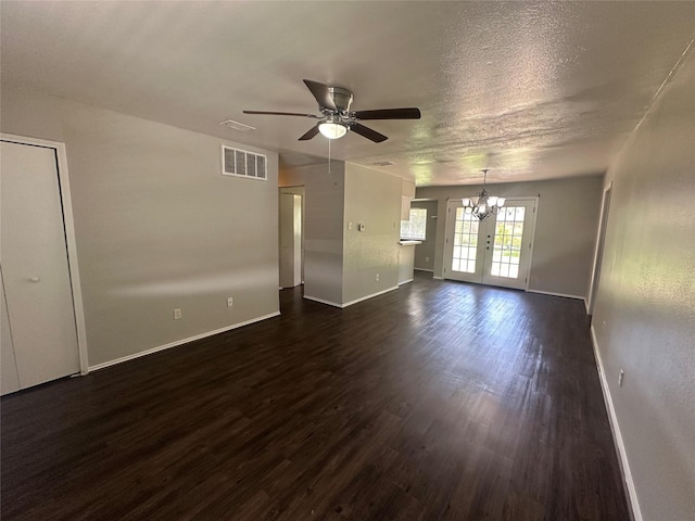 626 Sunset Dr, Garland, TX 75040 - interior space with visible vents, baseboards, ceiling fan with notable chandelier, and dark wood finished floors