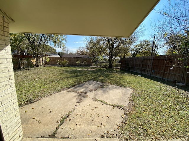 view of yard with a patio area