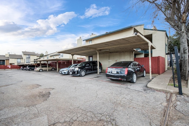 view of parking featuring a carport