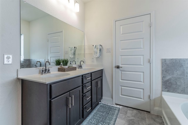 bathroom featuring a tub and vanity