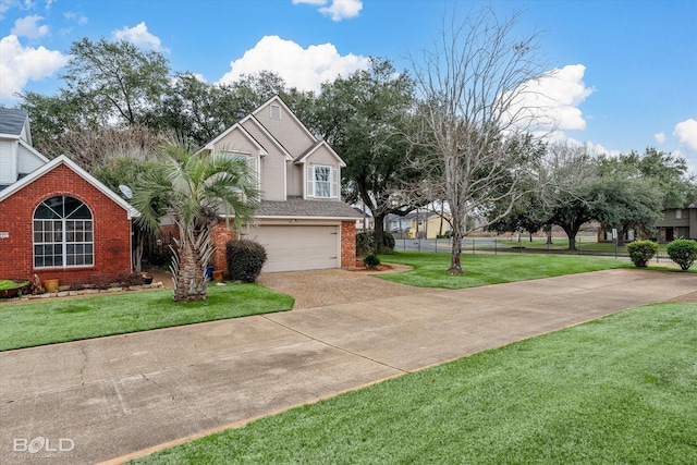 view of front of home featuring a front lawn and a garage