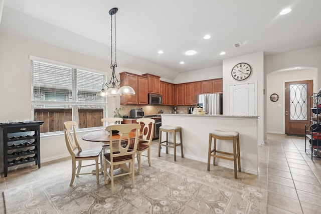 dining room with light tile patterned flooring