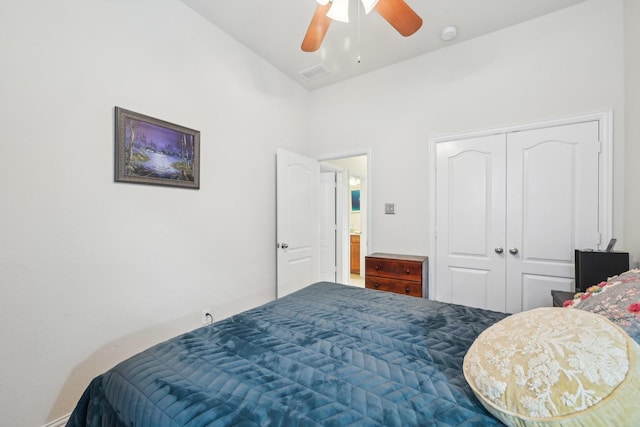 bedroom featuring ceiling fan and a closet