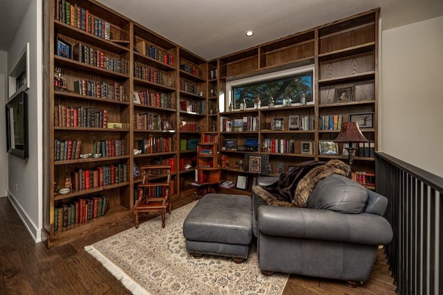 living area featuring dark hardwood / wood-style flooring