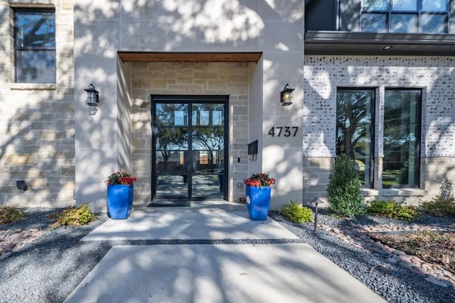 entrance to property featuring french doors