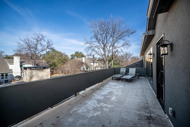 view of patio / terrace with a balcony