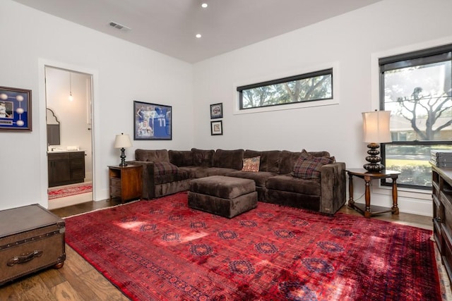 4737 Sugar Mill Rd, Dallas, TX 75244 - living room with wood finished floors, recessed lighting, and visible vents