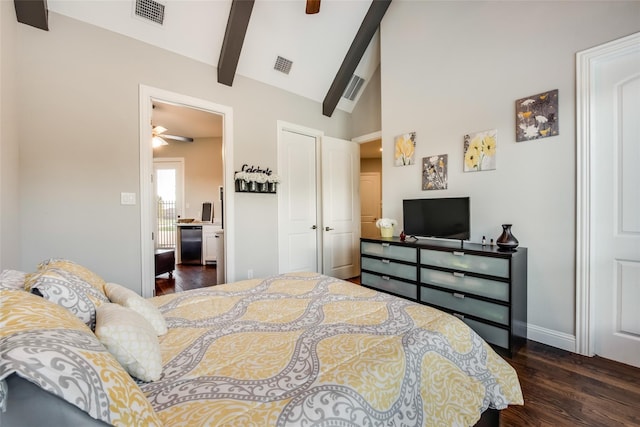 bedroom with dark hardwood / wood-style flooring, beam ceiling, high vaulted ceiling, and a closet