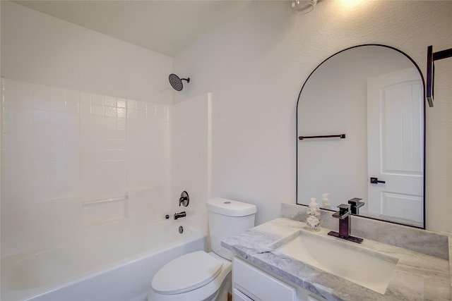 full bathroom featuring vanity, shower / tub combination, and toilet