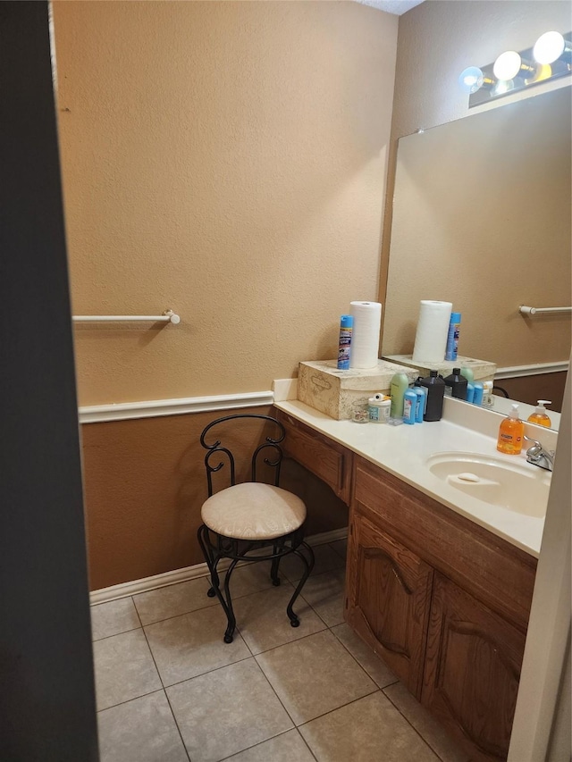 bathroom featuring tile patterned floors and vanity